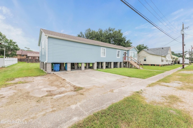206 N Fernand St, Delcambre, LA 70528 - back of property featuring concrete driveway