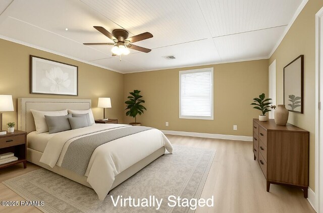 206 N Fernand St, Delcambre, LA 70528 - bedroom featuring light wood-type flooring, ornamental molding, and ceiling fan