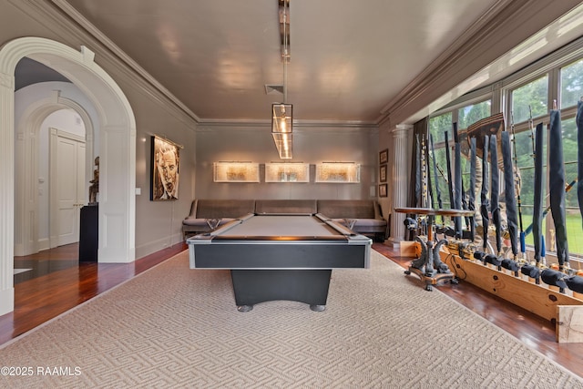 12425 N Marcus Rd, Abbeville, LA 70510 - recreation room featuring wood finished floors, crown molding, pool table, and arched walkways