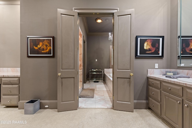 12425 N Marcus Rd, Abbeville, LA 70510 - bathroom featuring vanity, baseboards, a bath, carpet floors, and crown molding