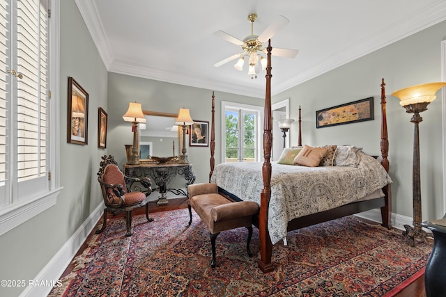 12425 N Marcus Rd, Abbeville, LA 70510 - bedroom featuring baseboards, ornamental molding, wood finished floors, and a ceiling fan
