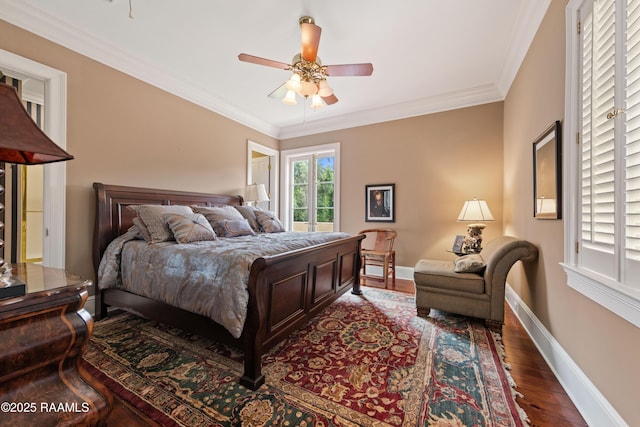 12425 N Marcus Rd, Abbeville, LA 70510 - bedroom featuring wood finished floors, baseboards, crown molding, and ceiling fan