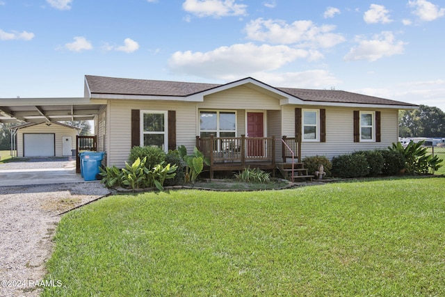 1037 Joe Kidder Rd, Arnaudville, LA 70512 - ranch-style home featuring driveway, covered porch, a front yard, an outdoor structure, and roof with shingles