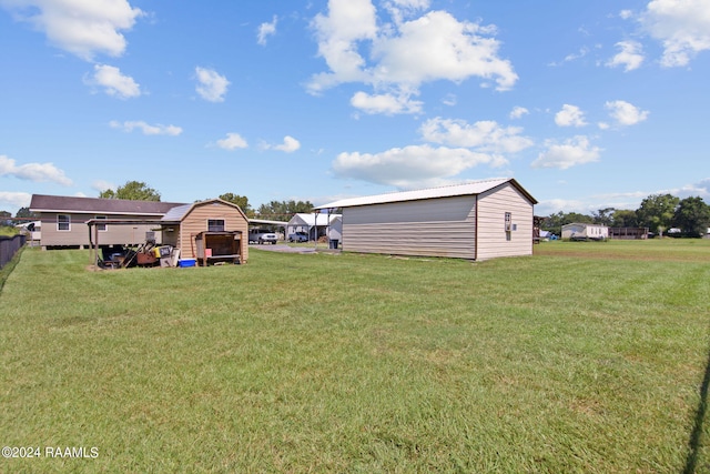 1037 Joe Kidder Rd, Arnaudville, LA 70512 - view of grassy yard with an outdoor structure