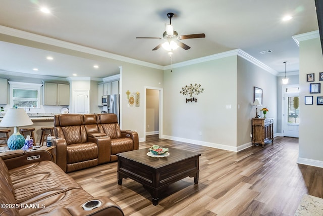 604 Bay Meadow Ln, Lafayette, LA 70507 - living area featuring ceiling fan, light wood-type flooring, baseboards, recessed lighting, and ornamental molding