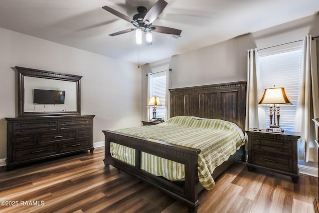 604 Bay Meadow Ln, Lafayette, LA 70507 - bedroom featuring wood finished floors, baseboards, and ceiling fan