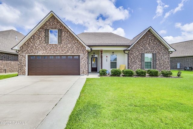 604 Bay Meadow Ln, Lafayette, LA 70507 - view of front of property featuring driveway, a front yard, brick siding, and roof with shingles