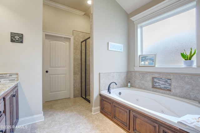 111 Grand Pointe Blvd, Lafayette, LA 70508 - full bath featuring a whirlpool tub, a stall shower, vanity, crown molding, and baseboards
