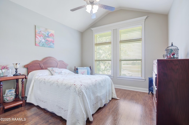 111 Grand Pointe Blvd, Lafayette, LA 70508 - bedroom with dark wood-type flooring, vaulted ceiling, baseboards, and ceiling fan