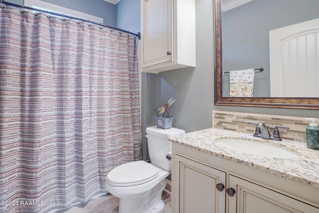 111 Grand Pointe Blvd, Lafayette, LA 70508 - full bath featuring toilet, vanity, crown molding, tasteful backsplash, and curtained shower