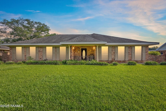 510 Monarch Dr, Lafayette, LA 70506 - view of front of home featuring a front yard and brick siding