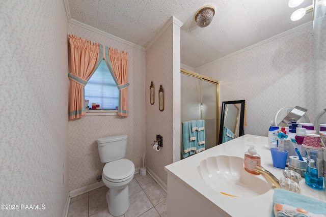 510 Monarch Dr, Lafayette, LA 70506 - full bathroom featuring ornamental molding, vanity, a shower stall, tile patterned flooring, and toilet