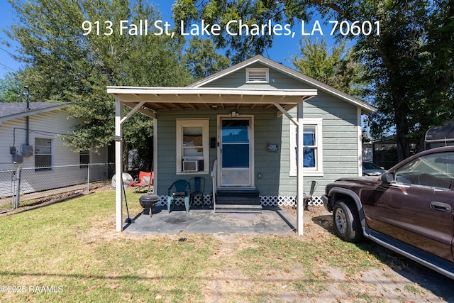 702 Sycamore St, Lake Charles, LA 70601 - shotgun-style home with entry steps and cooling unit