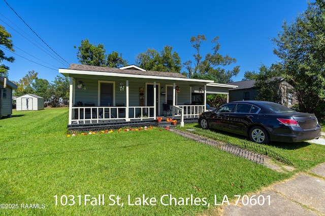 702 Sycamore St, Lake Charles, LA 70601 - view of front of property featuring a porch and a front lawn