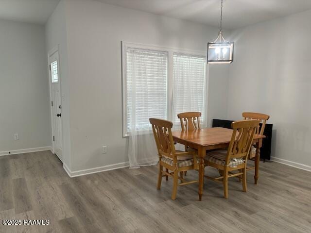 214 Dufilho Rd, Opelousas, LA 70570 - dining area with light wood-type flooring and baseboards