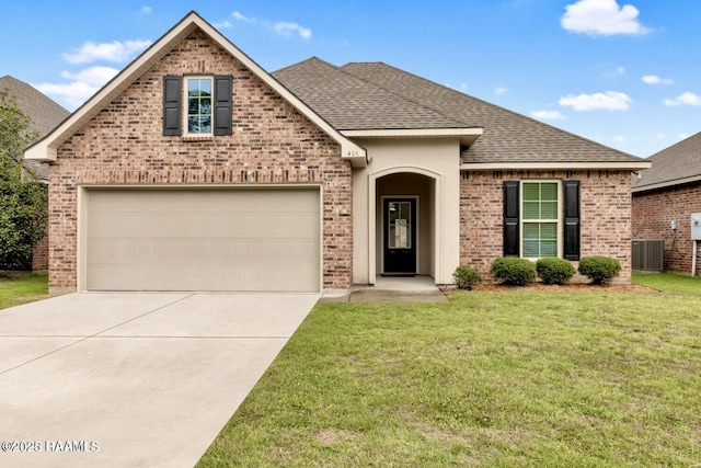 406 Elwick Dr, Lafayette, LA 70507 - view of front of house featuring brick siding, driveway, a shingled roof, and central AC