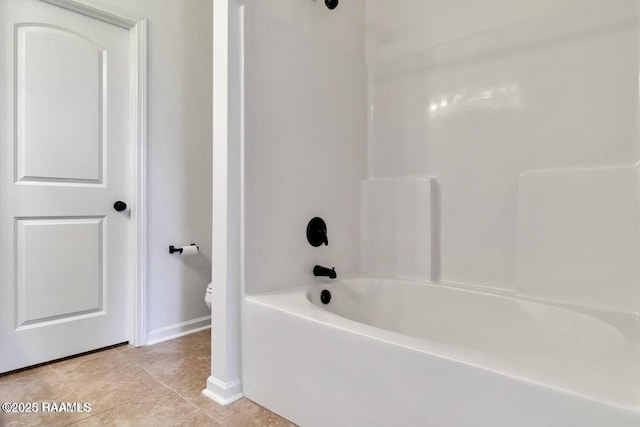 406 Elwick Dr, Lafayette, LA 70507 - full bathroom with tile patterned flooring, toilet, baseboards, and shower / tub combination
