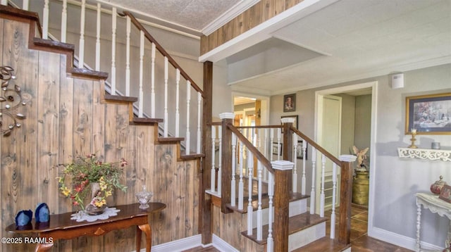 151 Hickory St, Port Barre, LA 70577 - stairway featuring crown molding and baseboards