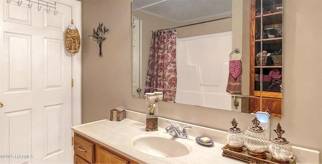 151 Hickory St, Port Barre, LA 70577 - full bathroom with vanity, crown molding, and a shower with shower curtain