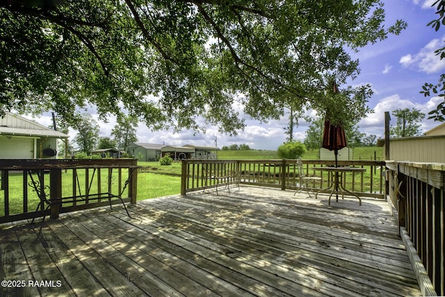 151 Hickory St, Port Barre, LA 70577 - wooden terrace with a lawn