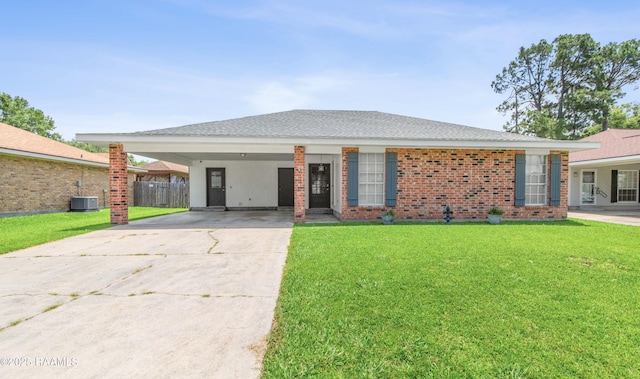 315 Creswell Ave, Scott, LA 70583 - ranch-style home with driveway, a front yard, an attached carport, and brick siding