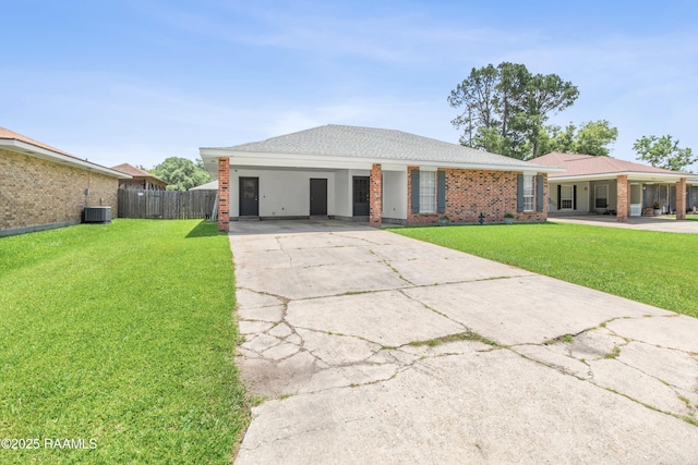 315 Creswell Ave, Scott, LA 70583 - view of front of property with driveway, central air condition unit, a carport, and brick siding