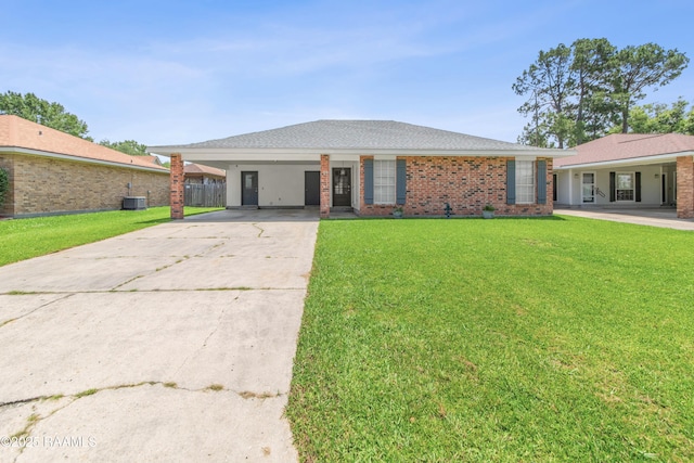 315 Creswell Ave, Scott, LA 70583 - single story home with concrete driveway, central AC, a carport, and brick siding
