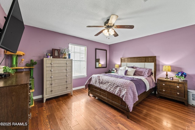 315 Creswell Ave, Scott, LA 70583 - bedroom with wood finished floors, baseboards, and a ceiling fan