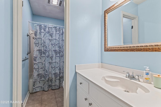 315 Creswell Ave, Scott, LA 70583 - full bathroom with vanity, tile patterned flooring, and shower / bathtub combination with curtain