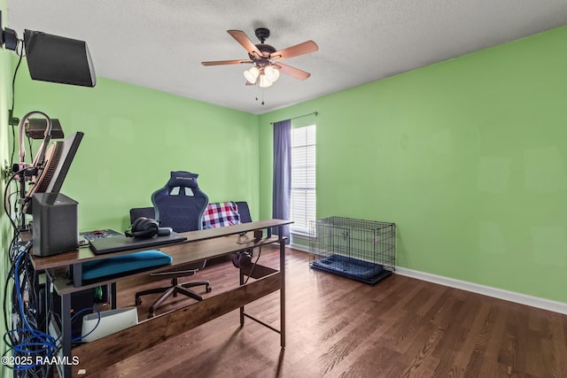 315 Creswell Ave, Scott, LA 70583 - office space featuring wood finished floors, baseboards, ceiling fan, and a textured ceiling