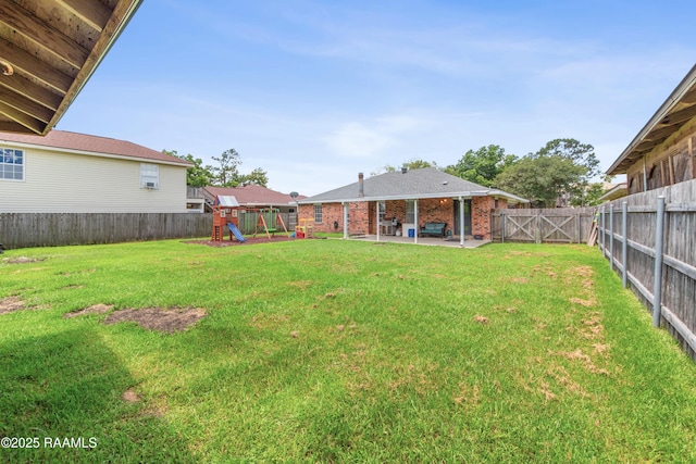 315 Creswell Ave, Scott, LA 70583 - view of yard featuring a playground and a patio