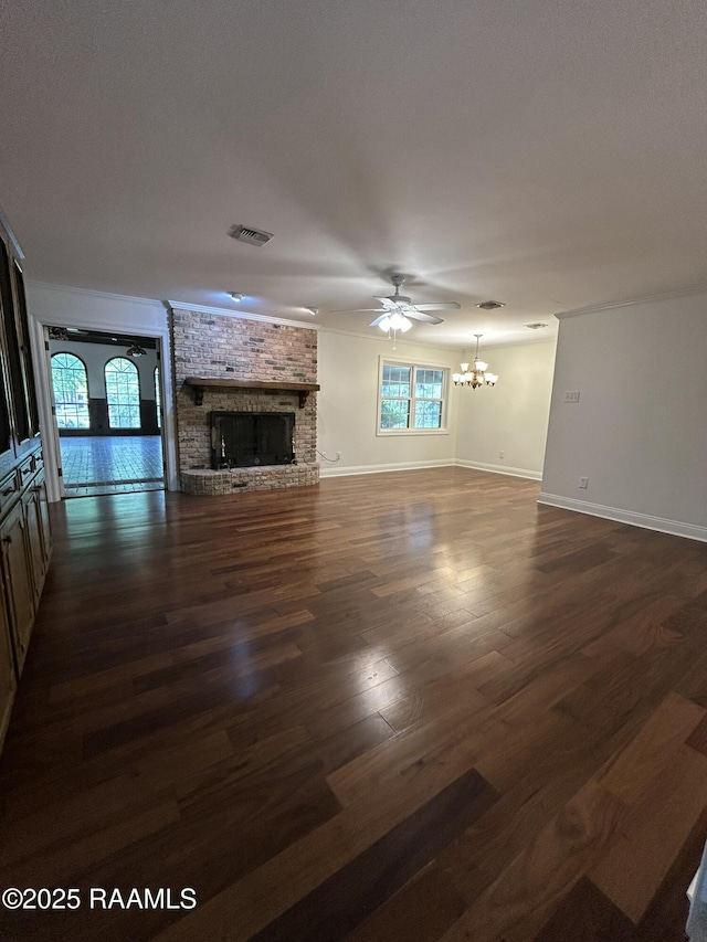 421 Lippi Blvd, Lafayette, LA 70508 - unfurnished living room with a chandelier, a fireplace, dark wood-style flooring, baseboards, and ceiling fan