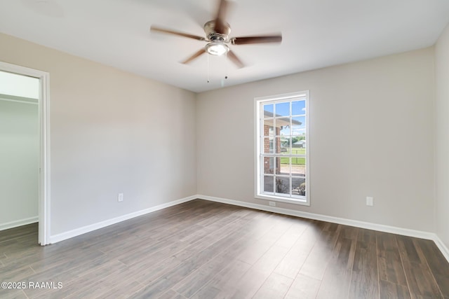 1010 Domingue St, Breaux Bridge, LA 70517 - unfurnished bedroom with wood finished floors, a ceiling fan, and a closet