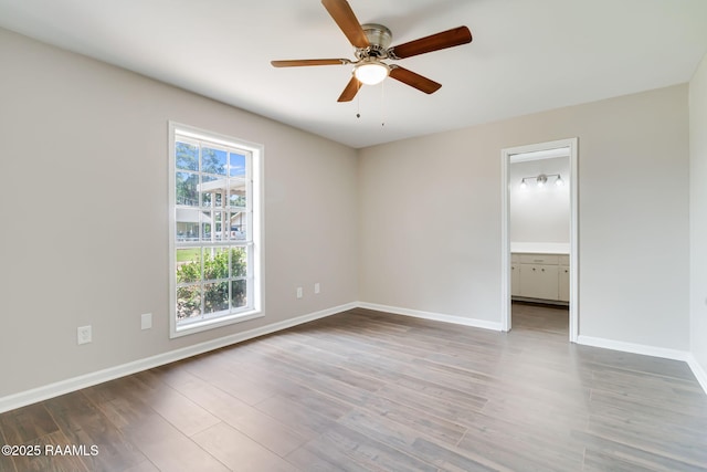 1010 Domingue St, Breaux Bridge, LA 70517 - spare room featuring a ceiling fan and wood finished floors