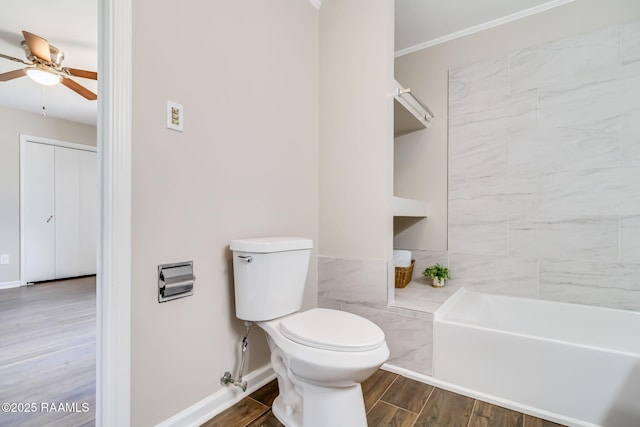 1010 Domingue St, Breaux Bridge, LA 70517 - full bath featuring wood finished floors, a ceiling fan, a bathtub, and crown molding