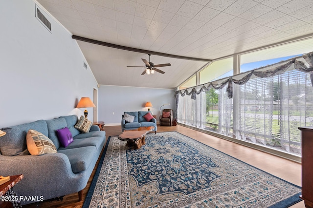 630 W Peach Ave, Eunice, LA 70535 - living room with lofted ceiling, a ceiling fan, and wood finished floors