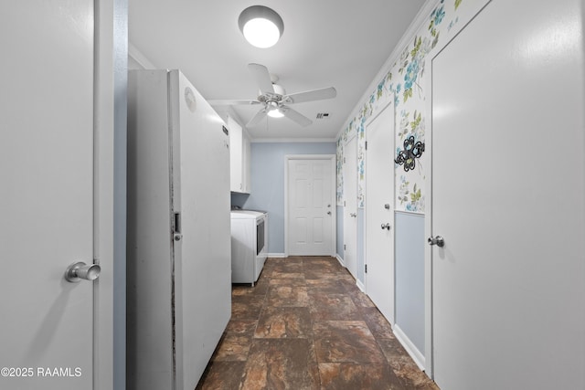 630 W Peach Ave, Eunice, LA 70535 - laundry area with cabinet space, stone finish flooring, a ceiling fan, baseboards, and ornamental molding