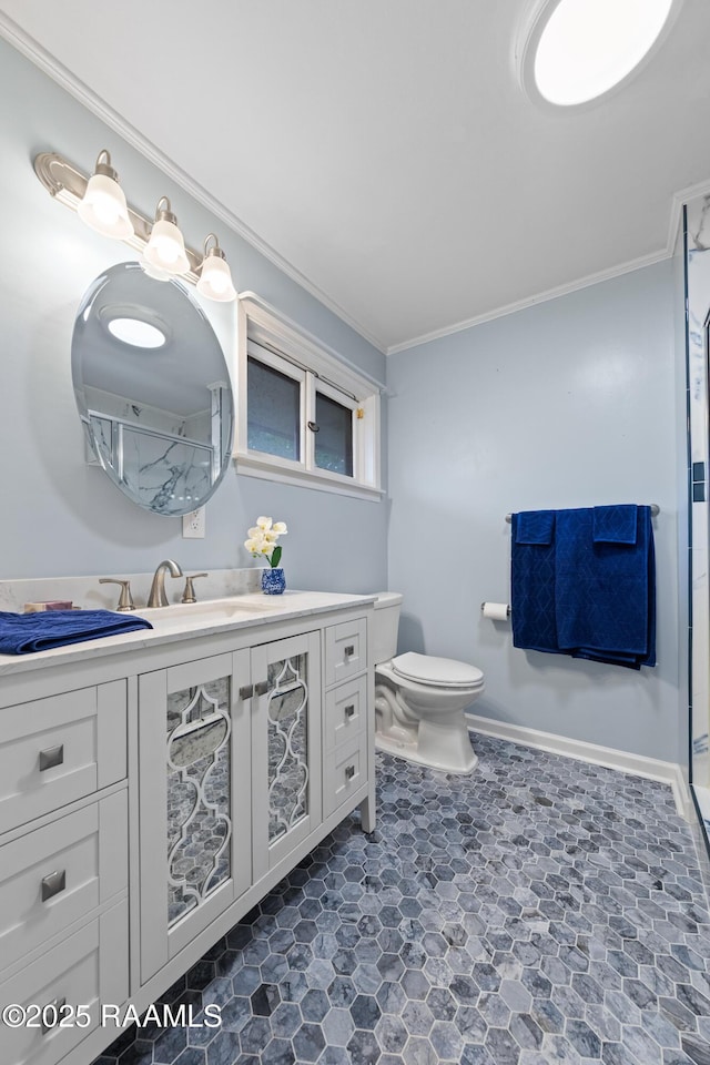 630 W Peach Ave, Eunice, LA 70535 - bathroom with vanity, toilet, crown molding, baseboards, and a shower