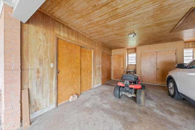 630 W Peach Ave, Eunice, LA 70535 - garage featuring wood ceiling and wooden walls