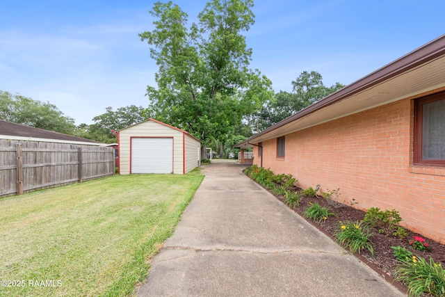 630 W Peach Ave, Eunice, LA 70535 - view of yard with an outdoor structure and a detached garage