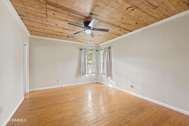 407 N Hebert Ave, Kaplan, LA 70548 - spare room with wooden ceiling, ornamental molding, a ceiling fan, wood finished floors, and baseboards
