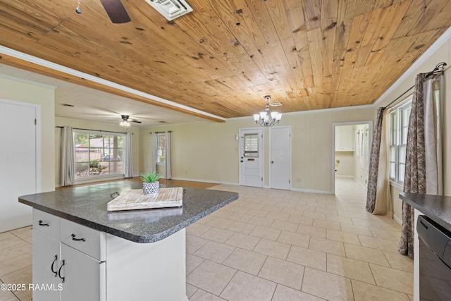407 N Hebert Ave, Kaplan, LA 70548 - kitchen featuring ceiling fan, wooden ceiling, dark countertops, open floor plan, and ornamental molding