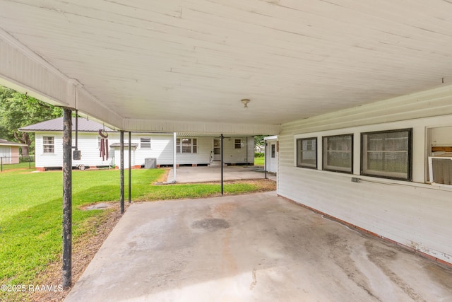 407 N Hebert Ave, Kaplan, LA 70548 - view of patio / terrace with a carport