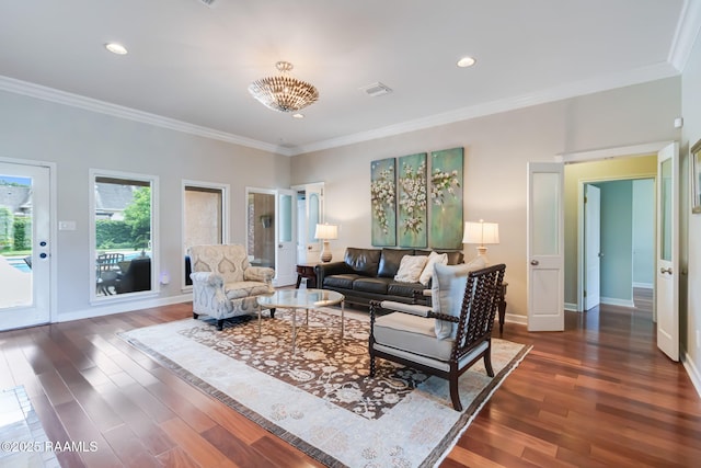 101 Hanover Sq, Lafayette, LA 70508 - living area with crown molding, dark wood-style flooring, recessed lighting, and a chandelier