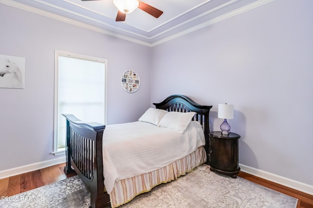 101 Hanover Sq, Lafayette, LA 70508 - bedroom featuring crown molding, light wood-style flooring, multiple windows, and a ceiling fan
