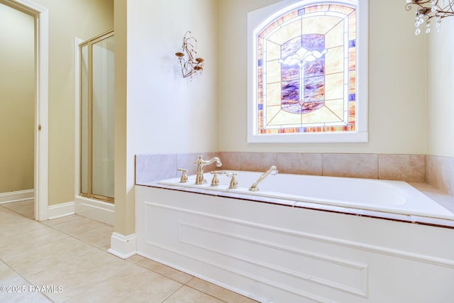 101 Hanover Sq, Lafayette, LA 70508 - bathroom featuring a shower stall, a garden tub, and tile patterned flooring