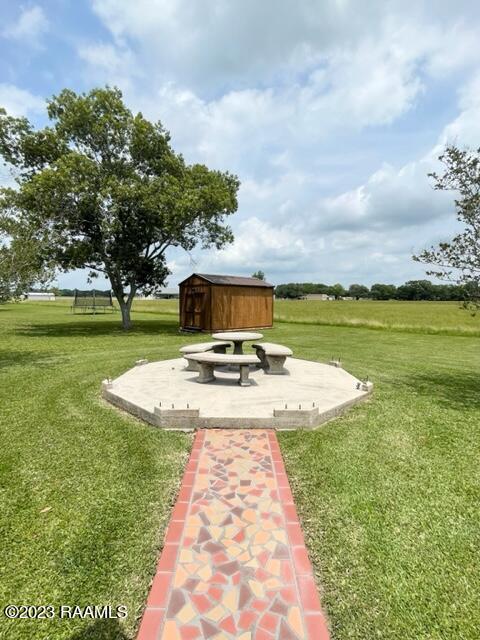 1944 Mills St, Scott, LA 70583 - view of grassy yard with a patio area