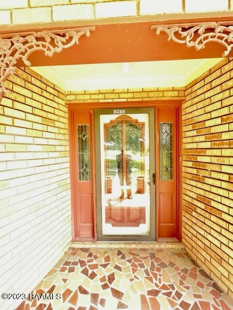 1944 Mills St, Scott, LA 70583 - entrance to property with brick siding