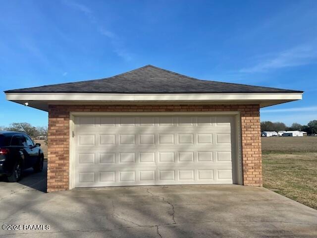 1944 Mills St, Scott, LA 70583 - garage with concrete driveway