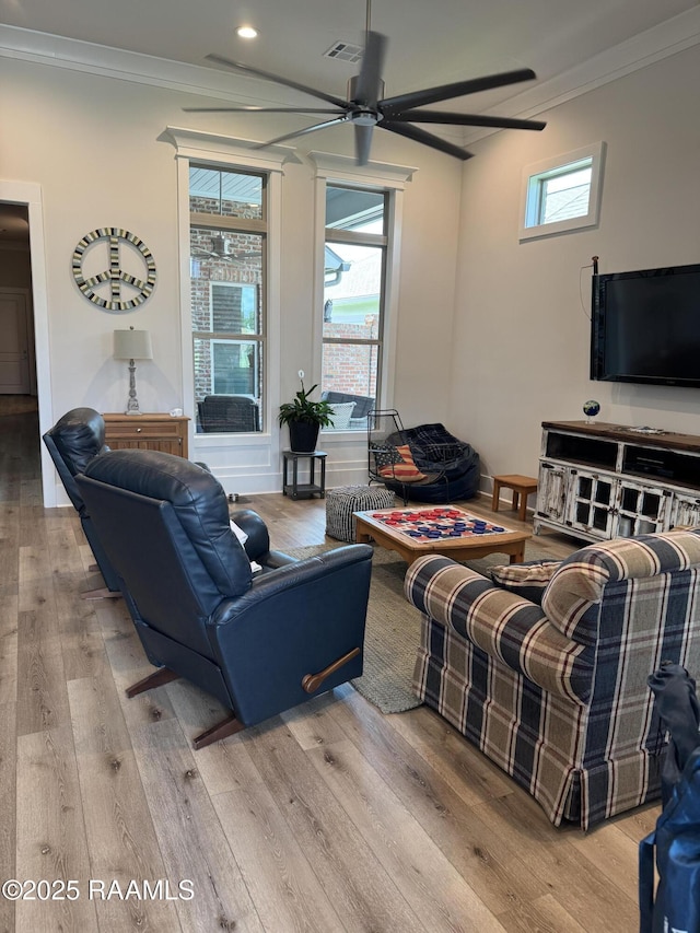 311 Villager Ave Unit C, Scott, LA 70583 - living room featuring crown molding, ceiling fan, wood finished floors, plenty of natural light, and recessed lighting